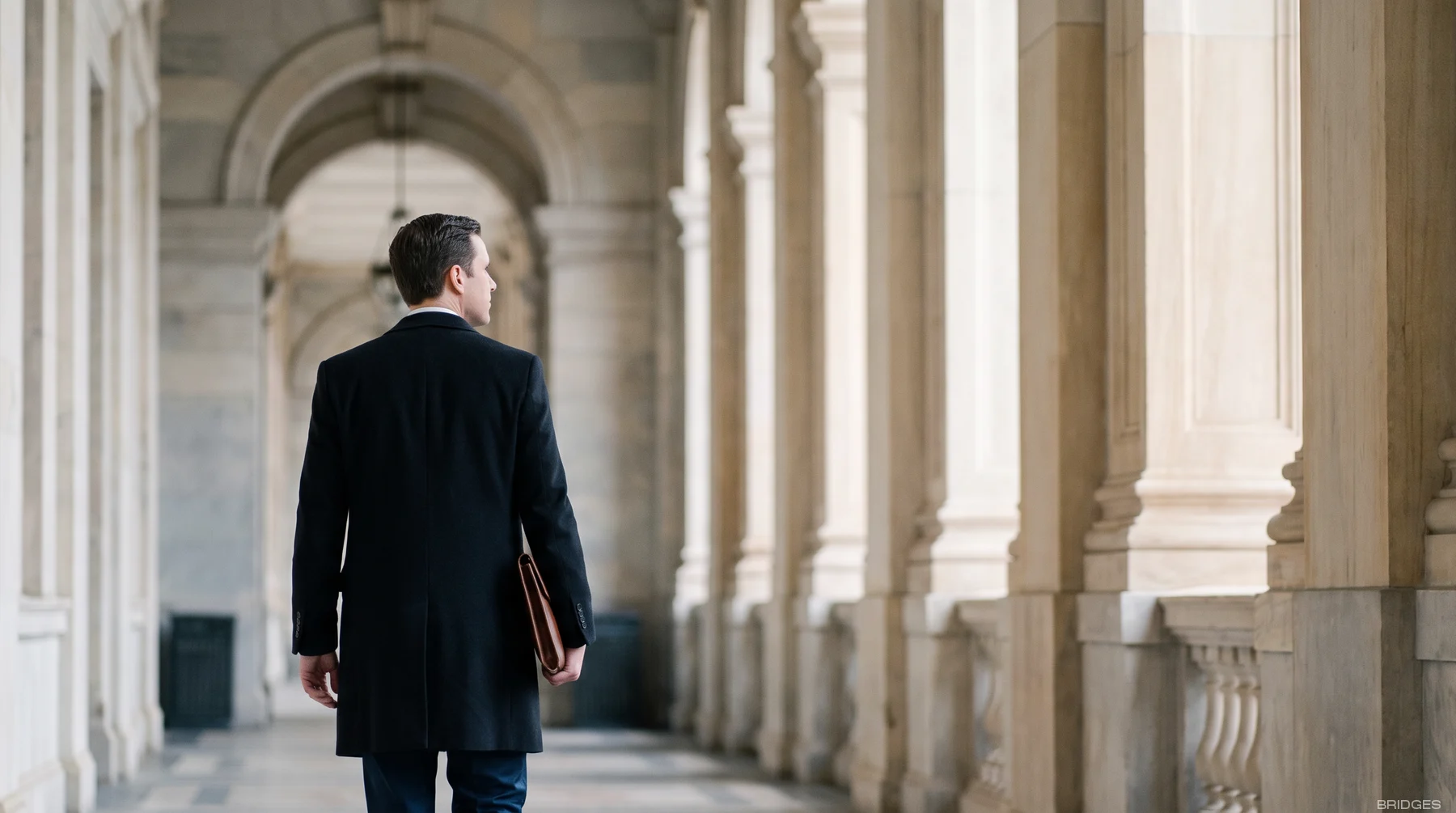 The colonnade of a state building: a citizen's status rests on law, not on promises