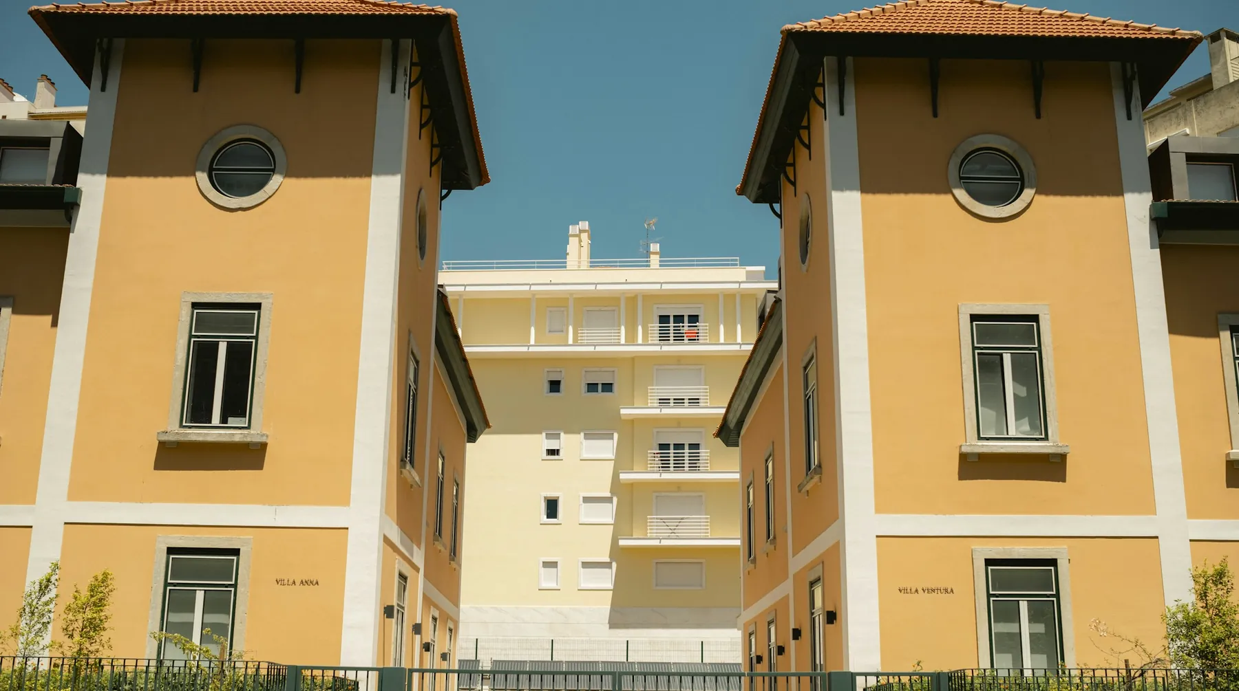 Maria Stavru holding apartment keys against Lisbon