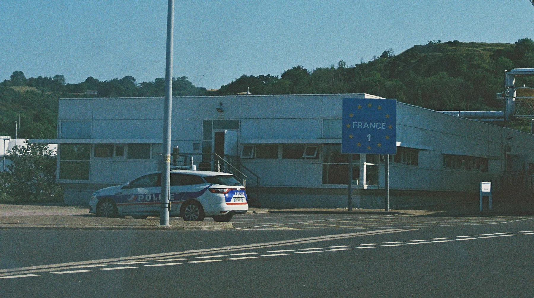 Police car at a border crossing into France