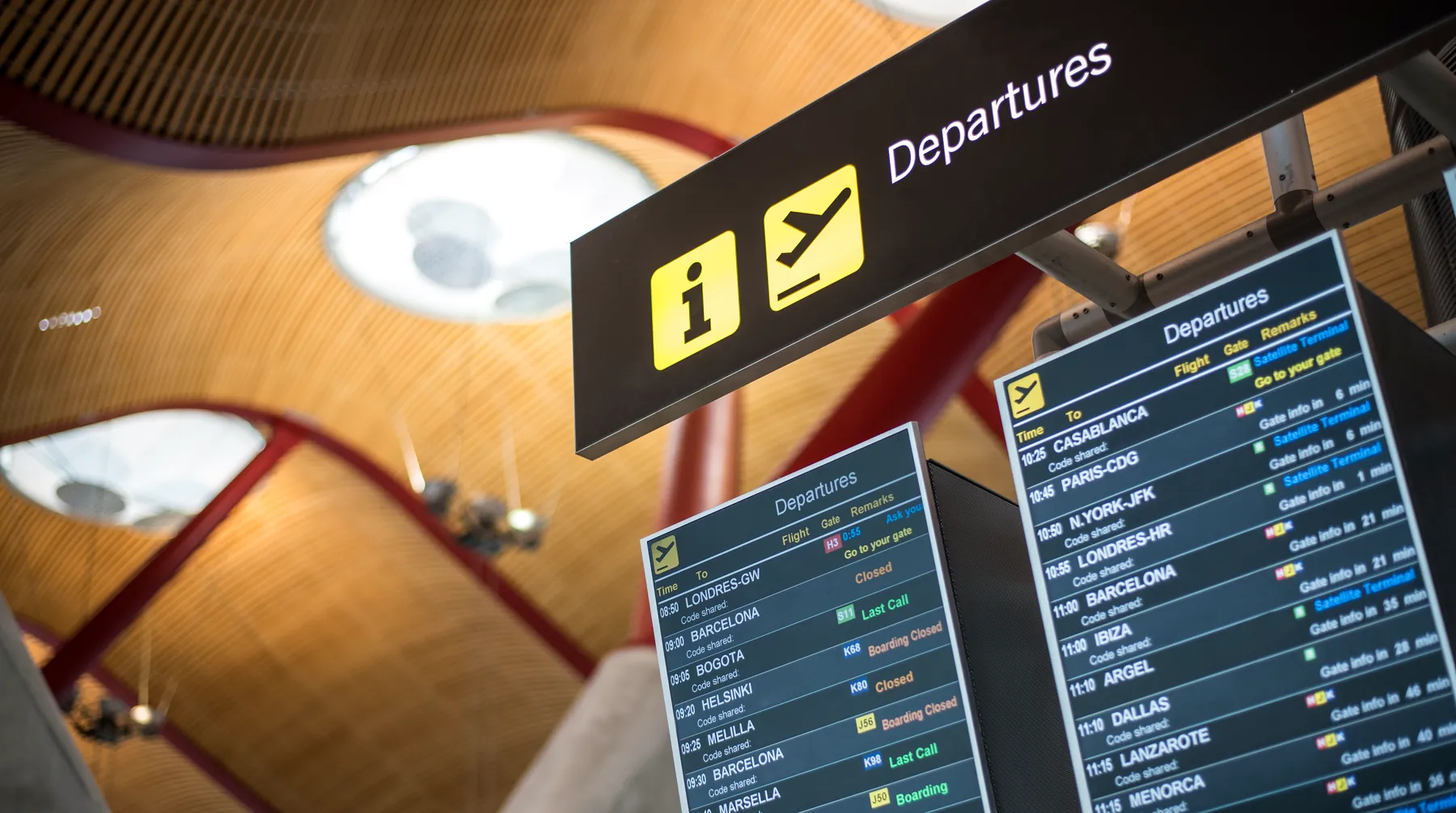 Departure boards at a European airport
