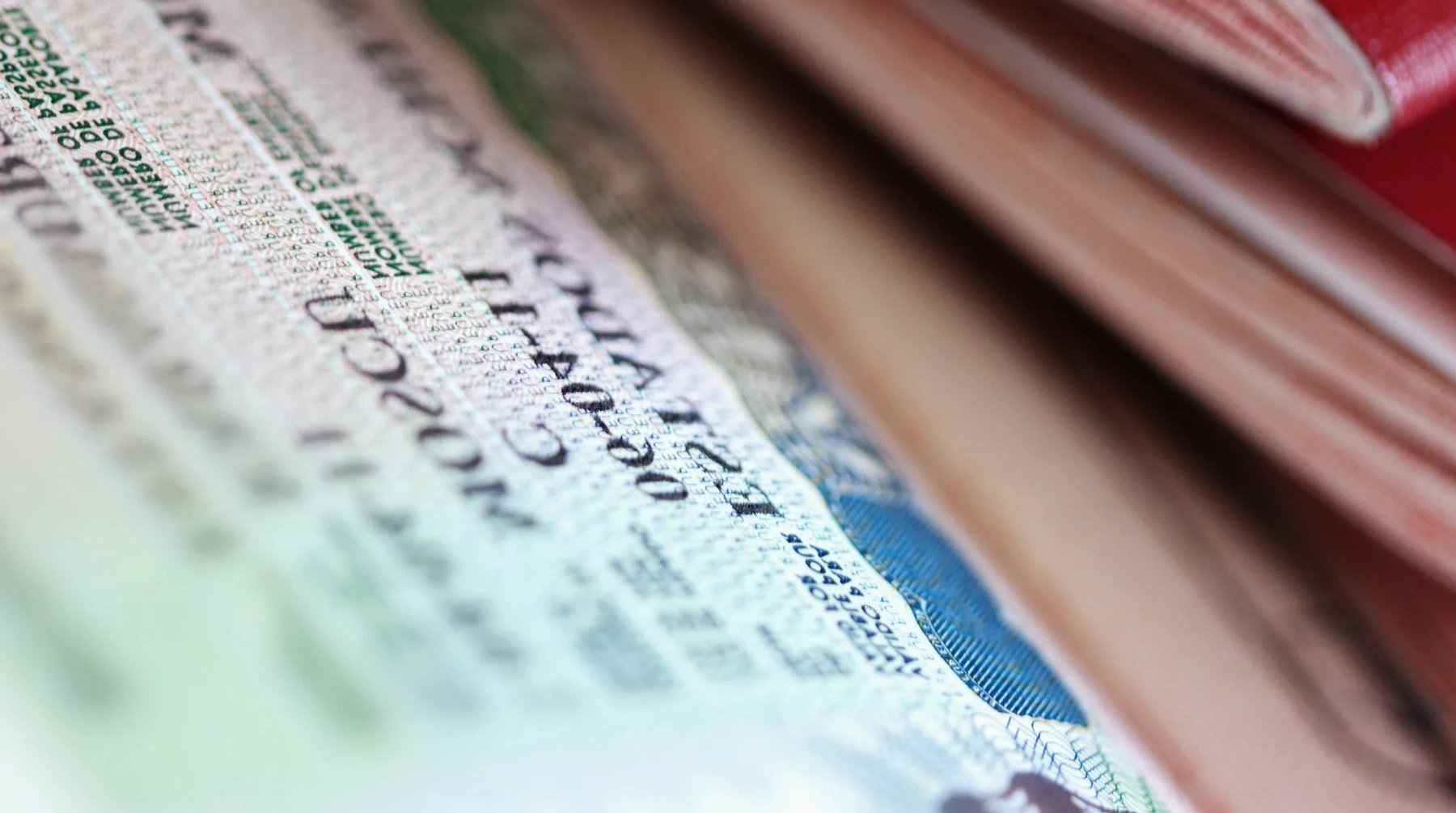 A Schengen visa issued in Moscow in a red passport