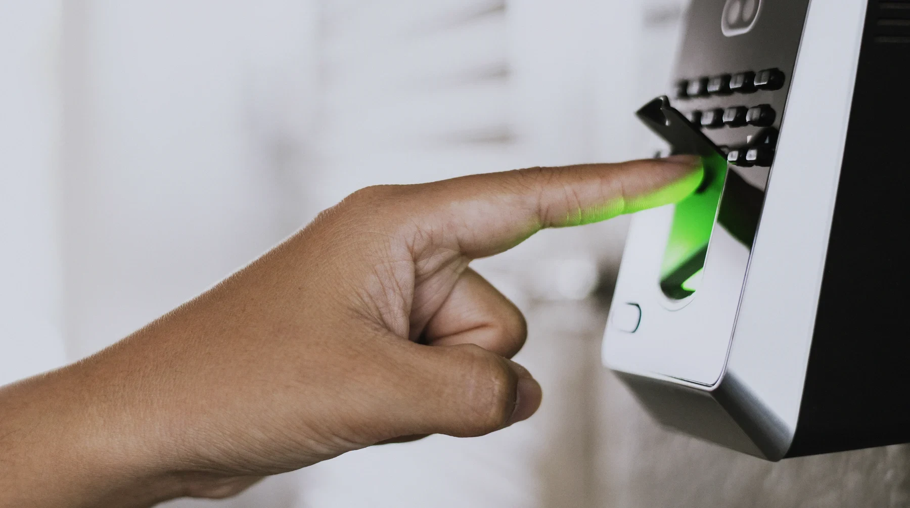 A finger on a fingerprint scanner